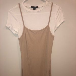 Mini nude bodycon dress with white tee underneath